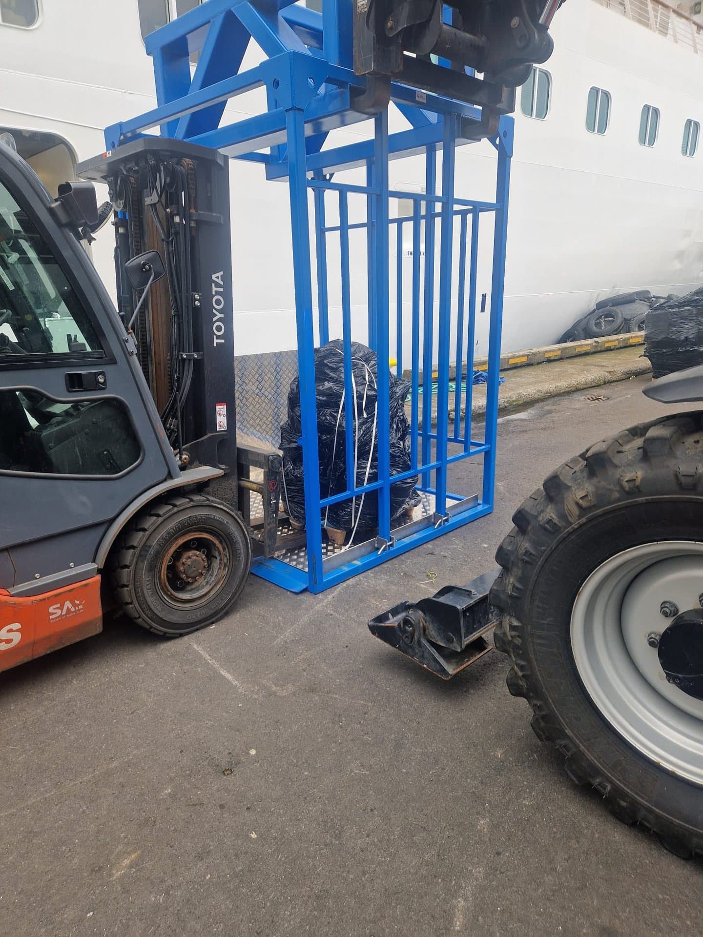 Luggage cage at vessel door