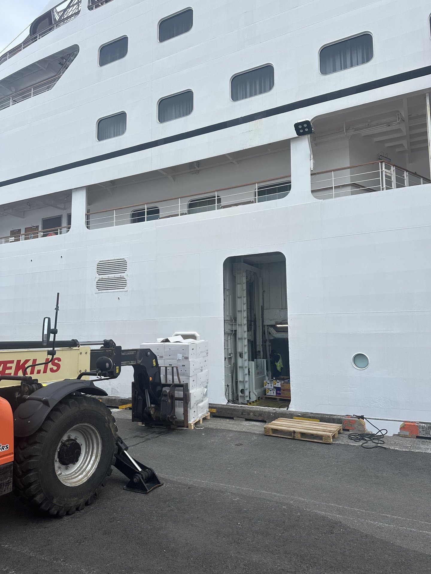 Forklift at vessel cargo hold